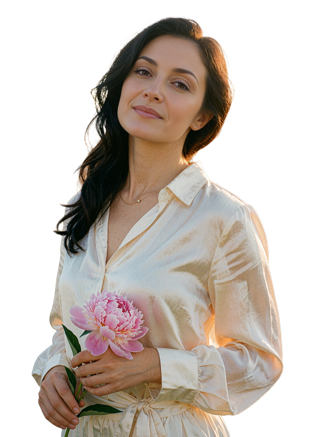 Poised Armenian woman in a cream silk blouse holding a pink peony in a sunlit garden